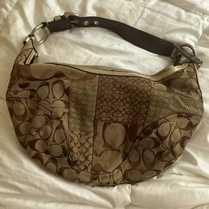Brown signature print Coac Hobo. Gold handle. mint condition.